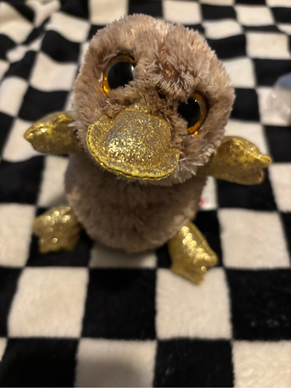 Perry the Platypus, a brown plush toy from the Ty Beanie Boos collection